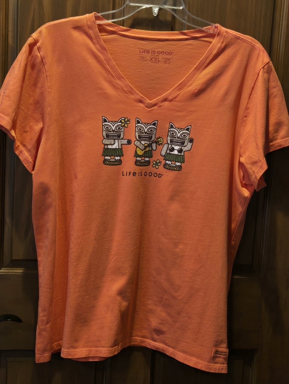 Life Is Good Women's Orange Short Sleeve V-Neck Tee with Tiki Cat Graphic